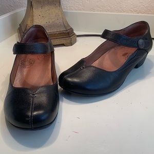 Black leather MaryJanes